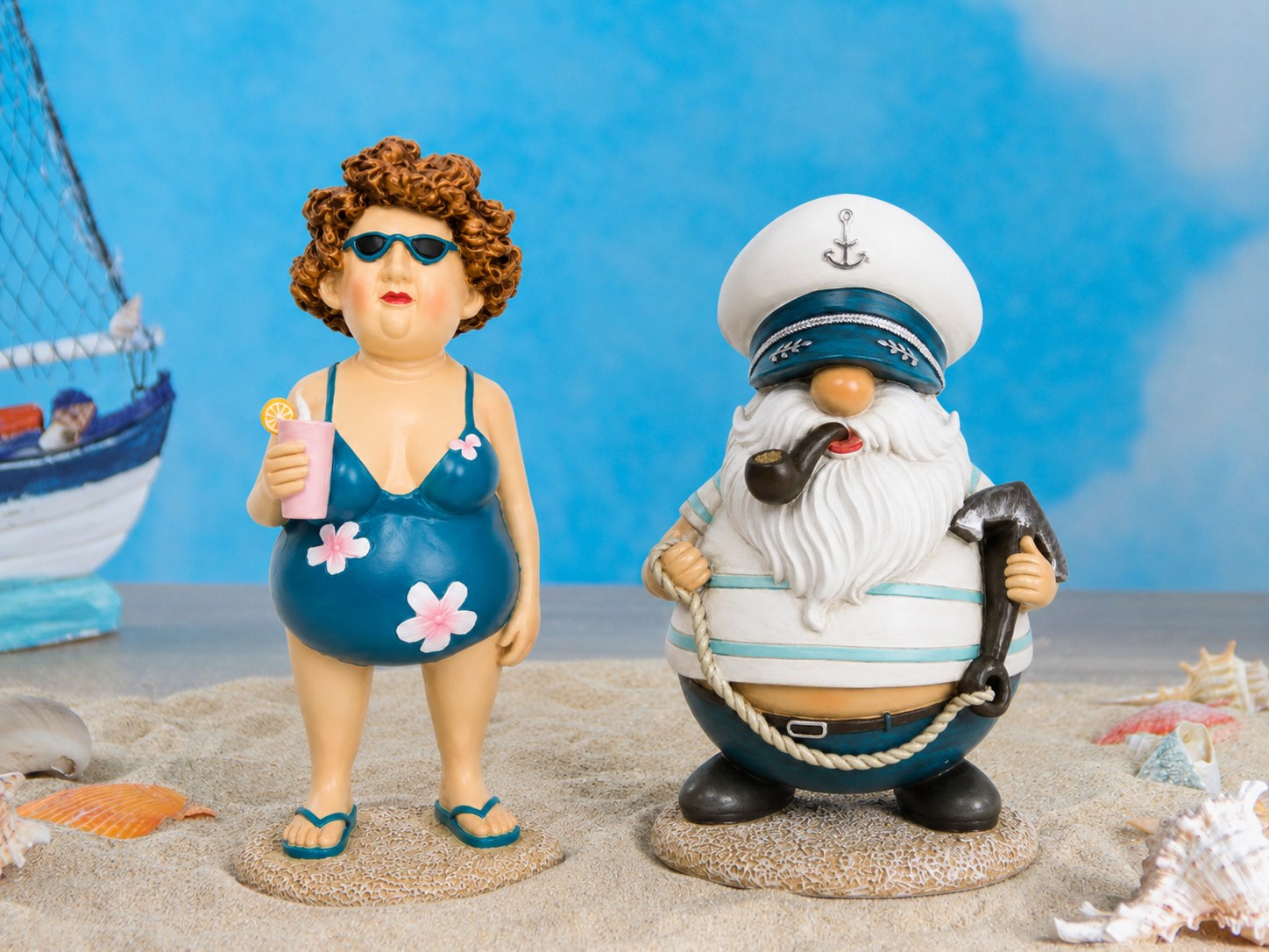 Resin beach lady and captain gnome styled on sand